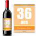 Bouteille de vin avec étiquette anniversaire jaune